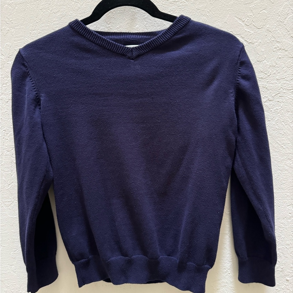 Gently used boys sweater. Blue v neck sweater. Boys size 7/8.